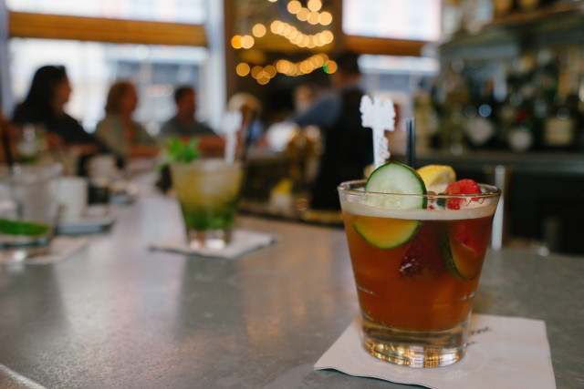 Enjoy a Pimm's Cup cocktail at the world-famous Carousel Bar inside Hotel Monteleone in the French Quarter of New Orleans.
