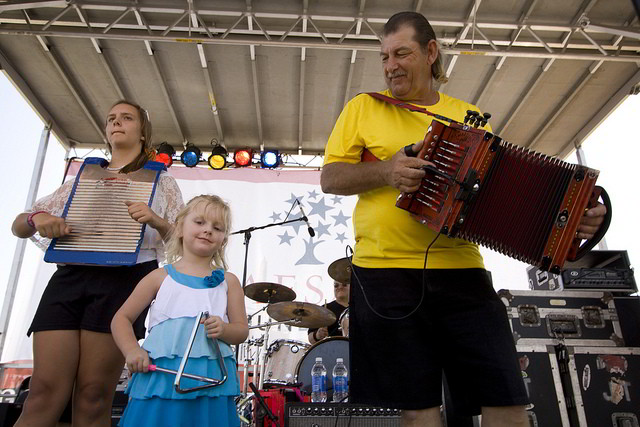 French Quarter Festival features more than 1,700 local Louisiana musicians on 23 different stages throughout the French Quarter. Photo courtesy Derek Bridges via Flickr.