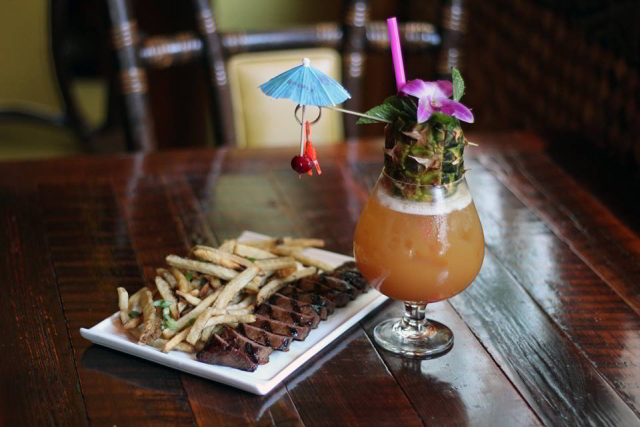 Locals love Latitude 29 for happy hour and late night tiki drinks and tropical bites.