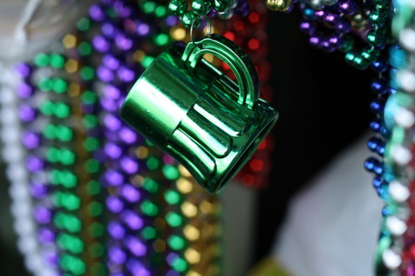 Expect to catch beads as well as unique throws like cabbages and Irish Spring soap at a New Orleans St. Patrick’s Day parade. (Photo courtesy Tom Pumphret on Flickr)