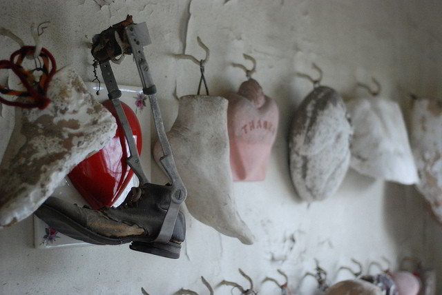 Local parishioners offer up a unique assortment of thank you gifts to St. Roch. (Photo via Michael Brownlee on Flickr)