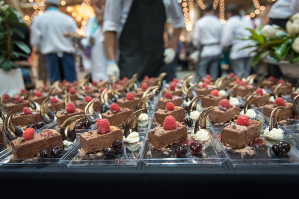 The New Orleans Wine & Food Experience culminates with The Big Gateaux Show, featuring decadent desserts and burlesque dancers. (Photo courtesy NOWFE)