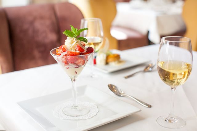 Indulge in our Strawberries Romanoff Martini with Grand Marnier Anglaise as part of our COOLinary dinner special.
